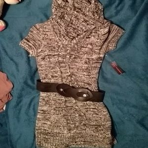 A grey and black dress with black belt